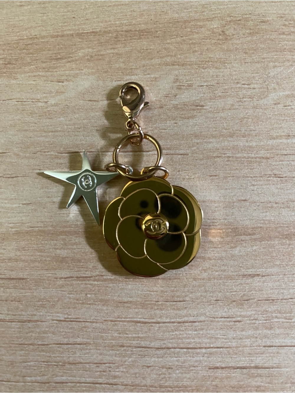 CHANEL Gold Camellia and Silver Star Charm Key Clip